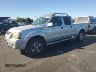 2002 Nissan Frontier XE z VIN 1N6ED29X02C375262, wystawiony jako Copart lot #57603855 z przebiegiem 417 271 mil mil oraz Szkoda całkowita • Salvage title. Historia ofert i sprzedaży dostępna na DreamBid. Obrazek 1.