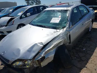 2001 Lexus ES with VIN JT8BF28G615110087, listed as a IAAI auction lot 41853786 with 152,048 mi miles. Bid and sale history available at carsss.com. Image 13.