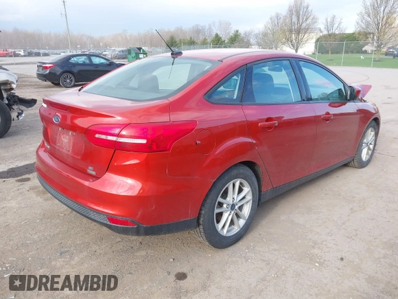 2018 Ford Focus SE with VIN 1FADP3FE6JL318552, listed as a IAAI auction lot 42090857 with 81,624 mi miles. Bid and sale history available at carsss.com. Image 4.