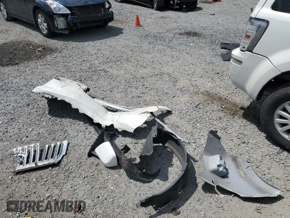 2009 Mercury Mariner Premier с VIN 4M2CU87709KJ14823, выставлен на аукционе Copart как лот 60121965 с пробегом Не указан миль и Списание • Salvage title. История ставок и продаж доступна на DreamBid. Изображение 13.