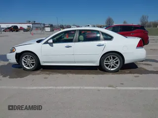 2014 Chevrolet Impala LTZ with VIN 2G1WC5E36E1182793, listed as a IAAI auction lot 41817899 with 171,776 mi miles and . Bid and sale history available at DreamBid. Image 14.