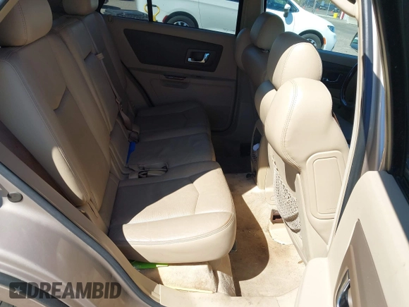 2006 Cadillac SRX z VIN 1GYEE637760197643, wystawiony jako IAAI lot #41864261 z przebiegiem 223 047 mil mil oraz . Historia ofert i sprzedaży dostępna na DreamBid. Obrazek 8.