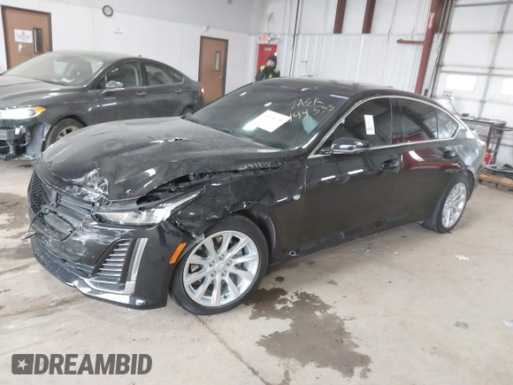 2021 Cadillac CT5 Luxury z VIN 1G6DX5RK0M0147667, wystawiony jako IAAI lot #41398726 z przebiegiem 50 387 mil mil oraz . Historia ofert i sprzedaży dostępna na DreamBid. Obrazek 17.