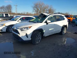 2019 Toyota RAV4 XLE Premium with VIN JTMA1RFV1KD023548, listed as a IAAI auction lot 41805406 with 75,501 mi miles. Bid and sale history available at carsss.com. Image 16.