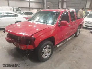 2012 Chevrolet Colorado LT w/1LT with VIN 1GCDSCFE1C8107998, listed as a IAAI auction lot 41592728 with 144,372 mi miles. Bid and sale history available at carsss.com. Image 2.