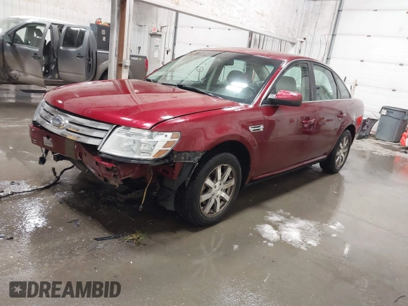 2008 Ford Taurus SEL with VIN 1FAHP27W38G172116, listed as a IAAI auction lot 41824616 with 176,864 mi miles. Bid and sale history available at carsss.com. Image 2.