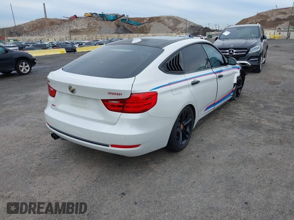 2016 BMW 3 Series GT 328i xDrive with VIN WBA8Z5C52GG502293, listed as a IAAI auction lot 42007325 with 64,659 mi miles. Bid and sale history available at carsss.com. Image 4.