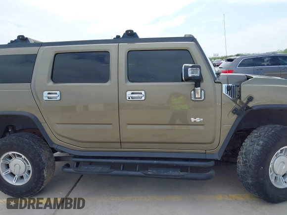 2006 Hummer H2 with VIN 5GRGN23U56H102574, listed as a IAAI auction lot 41955539 with 202,102 mi miles. Bid and sale history available at carsss.com. Image 14.