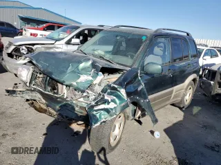 2002 Suzuki Grand Vitara z VIN JS3TE62V124152845, wystawiony jako Copart lot #74532904 z przebiegiem 142 117 mil mil oraz Szkoda całkowita • Salvage title. Historia ofert i sprzedaży dostępna na DreamBid. Obrazek 1.