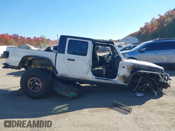 2020 Jeep Gladiator Sport S with VIN 1C6HJTAG3LL109494, listed as a IAAI auction lot 40677949 with 52,079 mi miles and . Bid and sale history available at DreamBid. Image 13.