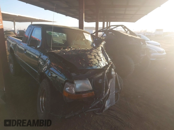 2000 Ford Ranger XL with VIN 1FTYR14C0YTB12536, listed as a IAAI auction lot 41033539 with 229,678 mi miles. Bid and sale history available at carsss.com. Image 1.
