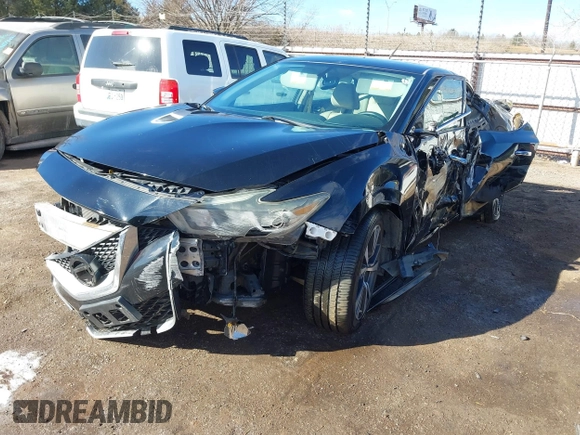 2016 Nissan Maxima SV with VIN 1N4AA6AP7GC435032, listed as a IAAI auction lot 41613039 with 104,274 mi miles and . Bid and sale history available at DreamBid. Image 2.