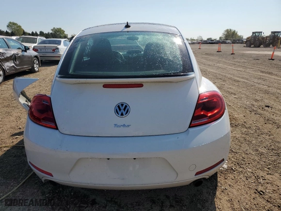 2012 Volkswagen Beetle 2.0T Turbo w/Sun/Sound with VIN 3VWV67AT5CM658403, listed as a Copart auction lot 71611614 with 10,878 mi miles and Salvage Title. Bid and sale history available at carsss.com. Image 6.