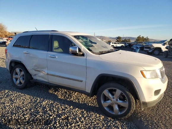 2011 Jeep Grand Cherokee Overland with VIN 1J4RS6GG9BC629680, listed as a Copart auction lot 83861474 with 175,547 mi miles and Salvage Title. Bid and sale history available at DreamBid. Image 4.