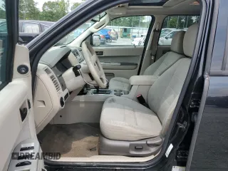 2010 Ford Escape Hybrid with VIN 1FMCU4K32AKB40357, listed as a Copart auction lot 59500025 with 169,955 mi miles and Salvage title. Bid and sale history available at DreamBid. Image 7.