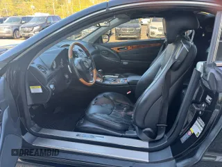 2009 Mercedes-Benz SL 550 z VIN WDBSK71F69F148290, wystawiony jako Copart lot #56976645 z przebiegiem 161 833 mil mil oraz Tytuł czysty. Historia ofert i sprzedaży dostępna na DreamBid. Obrazek 6.