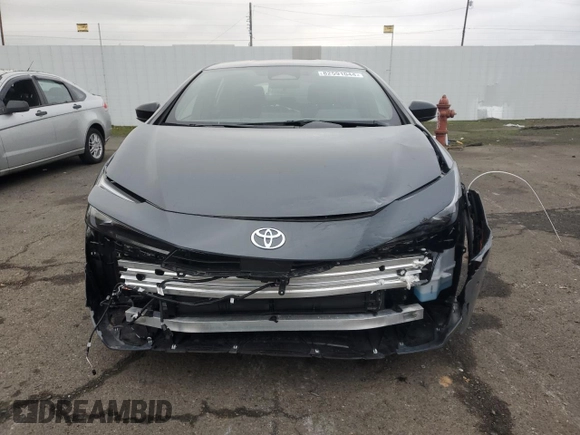 2024 Toyota Prius LE with VIN JTDACAAU4R3022601, listed as a Copart auction lot 82591044 with 9,798 mi miles and Salvage Title. Bid and sale history available at carsss.com. Image 5.
