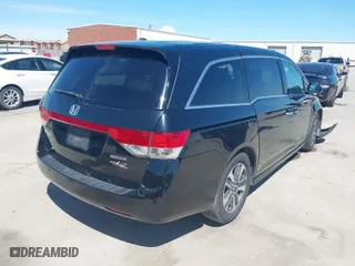 2016 Honda Odyssey Touring Elite with VIN 5FNRL5H95GB045915, listed as a IAAI auction lot 41869980 with 160,270 mi miles. Bid and sale history available at carsss.com. Image 4.