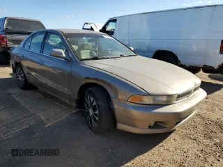 2001 Mitsubishi Galant ES z VIN 4A3AA46G71E214935, wystawiony jako Copart lot #77423604 z przebiegiem Nie podano mil oraz Czysty tytuł • Clean title. Historia ofert i sprzedaży dostępna na DreamBid. Obrazek 4.