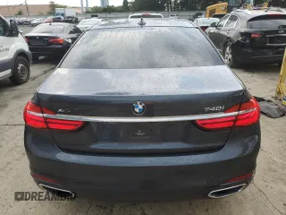 2017 BMW 7 Series 740i xDrive with VIN WBA7E4C32HGU99963, listed as a Copart auction lot 65848354 with 99,396 mi miles and Salvage Title. Bid and sale history available at carsss.com. Image 6.