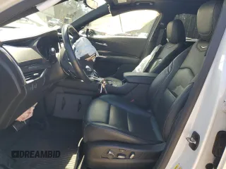 2021 Cadillac XT4 AWD Sport z VIN 1GYFZFR40MF006208, wystawiony jako Copart lot #53661335 z przebiegiem 24 785 mil mil oraz Szkody całkowita. Historia ofert i sprzedaży dostępna na DreamBid. Obrazek 7.