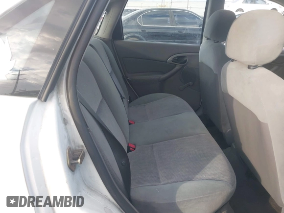 2000 Ford Focus LX with VIN 1FAFP33P3YW254784, listed as a IAAI auction lot 41429406 with 88,572 mi miles and . Bid and sale history available at carsss.com. Image 8.