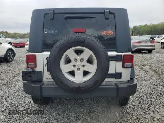 2008 Jeep Wrangler Unlimited X with VIN 1J4GB39148L565250, listed as a Copart auction lot 51170505 with 153,344 mi miles and Salvage Title. Bid and sale history available at DreamBid. Image 6.