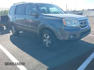 2011 Honda Pilot EX-L with VIN 5FNYF4H53BB015539, listed as a IAAI auction lot 41982857 with 230,604 mi miles. Bid and sale history available at carsss.com. Image 1.