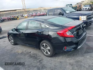 2020 Honda Civic Sedan LX with VIN 2HGFC2F69LH530736, listed as a IAAI auction lot 41765663 with 138,576 mi miles. Bid and sale history available at carsss.com. Image 3.
