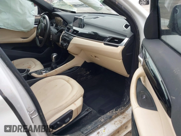 2018 BMW X1 xDrive28i with VIN WBXHT3C31J5K22765, listed as a IAAI auction lot 41800397 with 110,205 mi miles and . Bid and sale history available at DreamBid. Image 5.