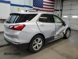 2020 Chevrolet Equinox Premier z VIN 2GNAXXEV3L6128099, wystawiony jako Copart lot #79041114 z przebiegiem 65 856 mil mil oraz Szkoda całkowita • Salvage title. Historia ofert i sprzedaży dostępna na DreamBid. Obrazek 3.