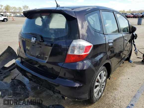 2013 Honda Fit Sport z VIN JHMGE8H68DC053863, wystawiony jako Copart lot #52140945 z przebiegiem Nie podano mil oraz Szkoda całkowita • Salvage title. Historia ofert i sprzedaży dostępna na DreamBid. Obrazek 3.