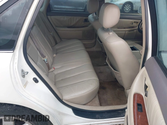 2001 Toyota Avalon XL z VIN 4T1BF28B01U114773, wystawiony jako IAAI lot #42506167 z przebiegiem 155 540 mil mil oraz . Historia ofert i sprzedaży dostępna na DreamBid. Obrazek 8.