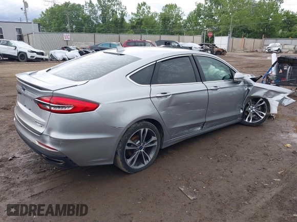 2020 Ford Fusion Titanium with VIN 3FA6P0D98LR115437, listed as a IAAI auction lot 42331052 with 127,346 mi miles and . Bid and sale history available at DreamBid. Image 4.