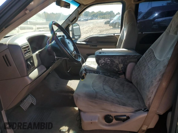2000 Ford F-350 XL with VIN 1FTSW31F7YEE20820, listed as a Copart auction lot 77496284 with 312,193 mi miles and Salvage Title. Bid and sale history available at DreamBid. Image 7.