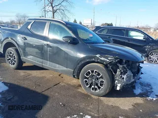 2022 Hyundai Santa Cruz SEL Premium z VIN 5NTJDDAF0NH037208, wystawiony jako IAAI lot #41536366 z przebiegiem 66 096 mil mil oraz . Historia ofert i sprzedaży dostępna na DreamBid. Obrazek 1.