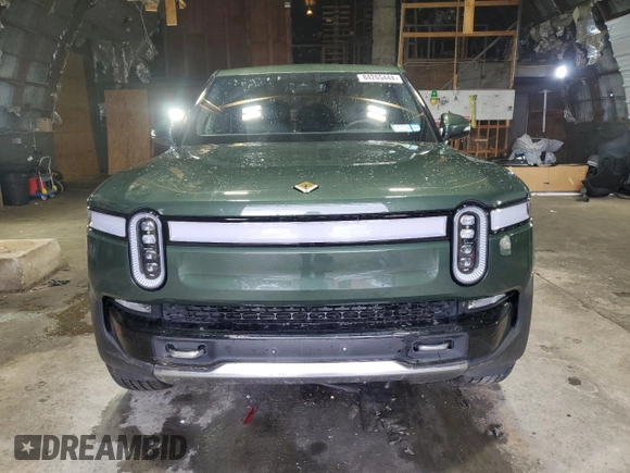 2023 Rivian R1T Adventure with VIN 7FCTGAAA0PN024165, listed as a Copart auction lot 84265444 with Not Provided miles and Salvage Title. Bid and sale history available at carsss.com. Image 5.