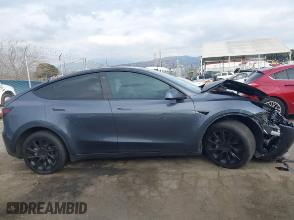2023 Tesla Model Y Long Range with VIN 7SAYGDEE4PA028440, listed as a IAAI auction lot 41488136 with 29,229 mi miles and . Bid and sale history available at DreamBid. Image 12.