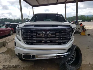 2023 GMC Sierra 1500 Denali Ultimate with VIN 1GTUUHEL0PZ318889, listed as a Copart auction lot 71713984 with 8,986 mi miles and Salvage Title. Bid and sale history available at carsss.com. Image 5.