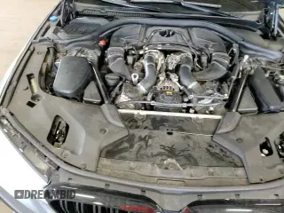 2018 BMW 5 Series M550i xDrive with VIN WBAJB9C51JB034817, listed as a Copart auction lot 69056245 with 132,405 mi miles and Salvage title. Bid and sale history available at DreamBid. Image 15.