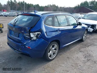 2014 BMW X1 xDrive28i with VIN WBAVL1C58EVY24491, listed as a IAAI auction lot 42022672 with 115,123 mi miles. Bid and sale history available at carsss.com. Image 4.