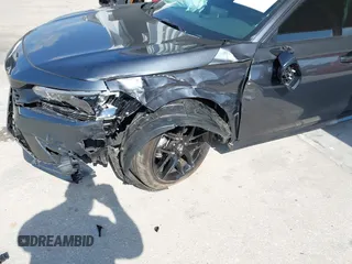 2024 Honda Civic Sport z VIN 2HGFE2F54RH533652, wystawiony jako IAAI lot #42123727 z przebiegiem 13 893 mil mil oraz . Historia ofert i sprzedaży dostępna na DreamBid. Obrazek 6.