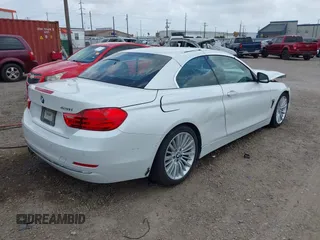 2015 BMW 4 Series 428i z VIN WBA3V5C53FP751805, wystawiony jako IAAI lot #42150102 z przebiegiem 113 381 mil mil oraz . Historia ofert i sprzedaży dostępna na DreamBid. Obrazek 4.