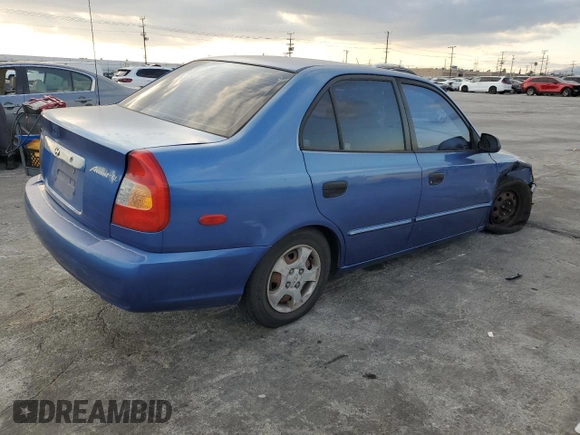 2001 Hyundai Accent GL with VIN KMHCG45C91U195735, listed as a Copart auction lot 80950554 with 164,176 mi miles and Salvage Title. Bid and sale history available at carsss.com. Image 3.