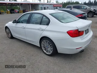 2012 BMW 3 Series 328i with VIN WBA3A5C56CF340427, listed as a IAAI auction lot 42246689 with 149,419 mi miles and . Bid and sale history available at DreamBid. Image 3.