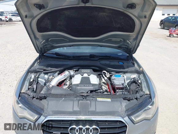 2012 Audi A6 Premium Plus with VIN WAUGGAFC6CN079518, listed as a IAAI auction lot 42143562 with 102,047 mi miles and . Bid and sale history available at DreamBid. Image 10.