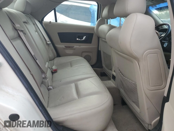 2005 Cadillac CTS with VIN 1G6DP567150184423, listed as a Copart auction lot 67417054 with 157,814 mi miles and Salvage Title. Bid and sale history available at carsss.com. Image 10.
