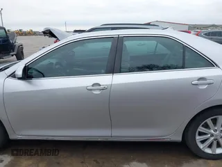 2014 Toyota Camry SE with VIN 4T1BK1FK7EU540975, listed as a IAAI auction lot 41673926 with 190,036 mi miles. Bid and sale history available at carsss.com. Image 14.