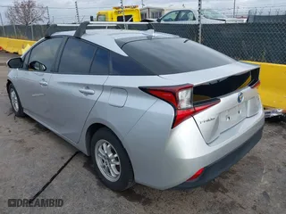 2019 Toyota Prius L Eco with VIN JTDKARFUXK3085578, listed as a IAAI auction lot 41073531 with 104,445 mi miles. Bid and sale history available at carsss.com. Image 3.