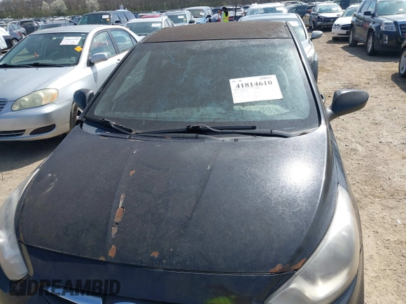 2012 Hyundai Accent SE with VIN KMHCU5AE8CU015055, listed as a IAAI auction lot 41814610 with 141,769 mi miles. Bid and sale history available at carsss.com. Image 6.